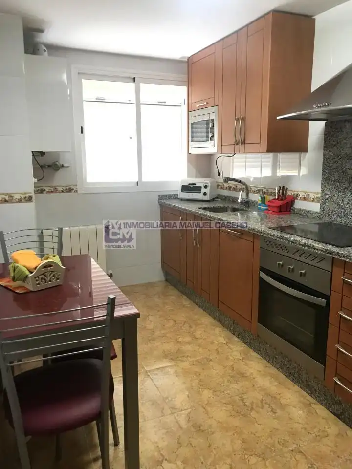 Kitchen of Flat for rent in Cáceres  with Heating, Terrace and Storage room