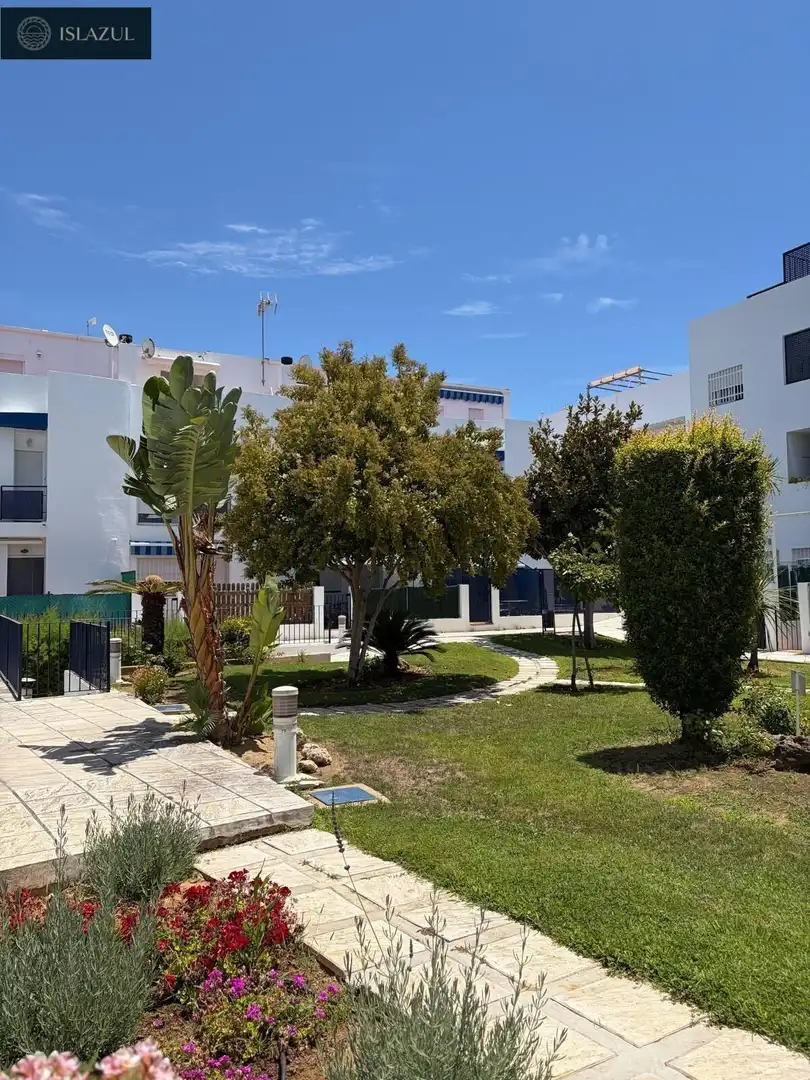 Außenansicht von Maisonette zum Verkauf in Islantilla mit Klimaanlage, Heizung und Privatgarten