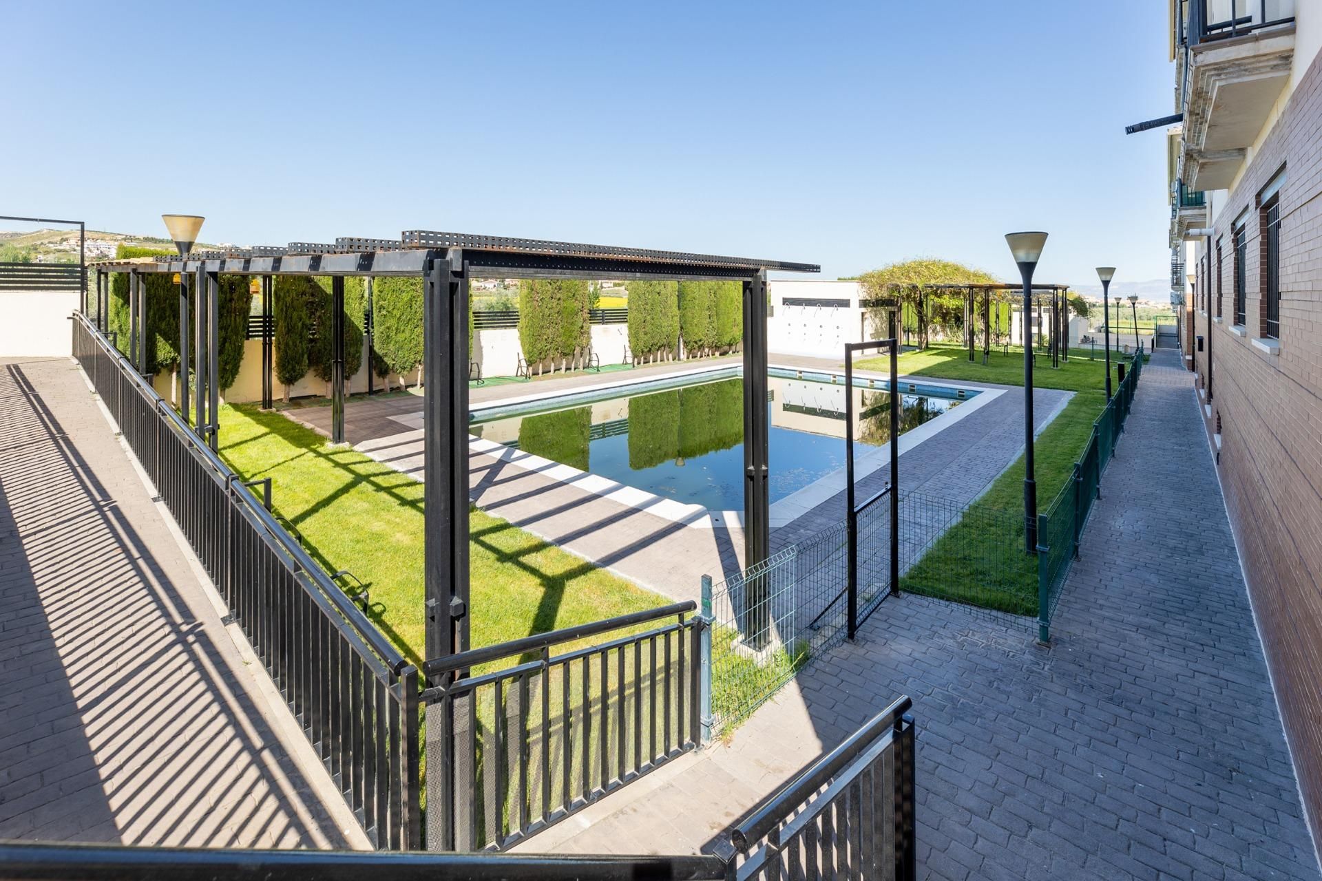 Swimming pool of Single-family semi-detached for sale in Las Gabias  with Air Conditioner, Heating and Private garden