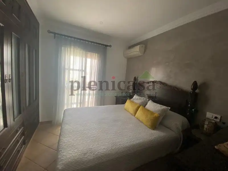 Habitación de Casa adosada en venta en Punta Umbría con Aire acondicionado, Calefacción y Jardín privado