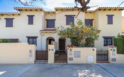 Exterior view of Single-family semi-detached for sale in Roda de Berà  with Air Conditioner, Terrace and Swimming Pool