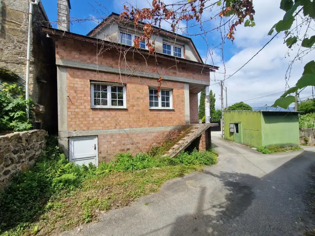 Vista exterior de Casa o xalet en venda en Rianxo amb Jardí privat, Traster i Balcó