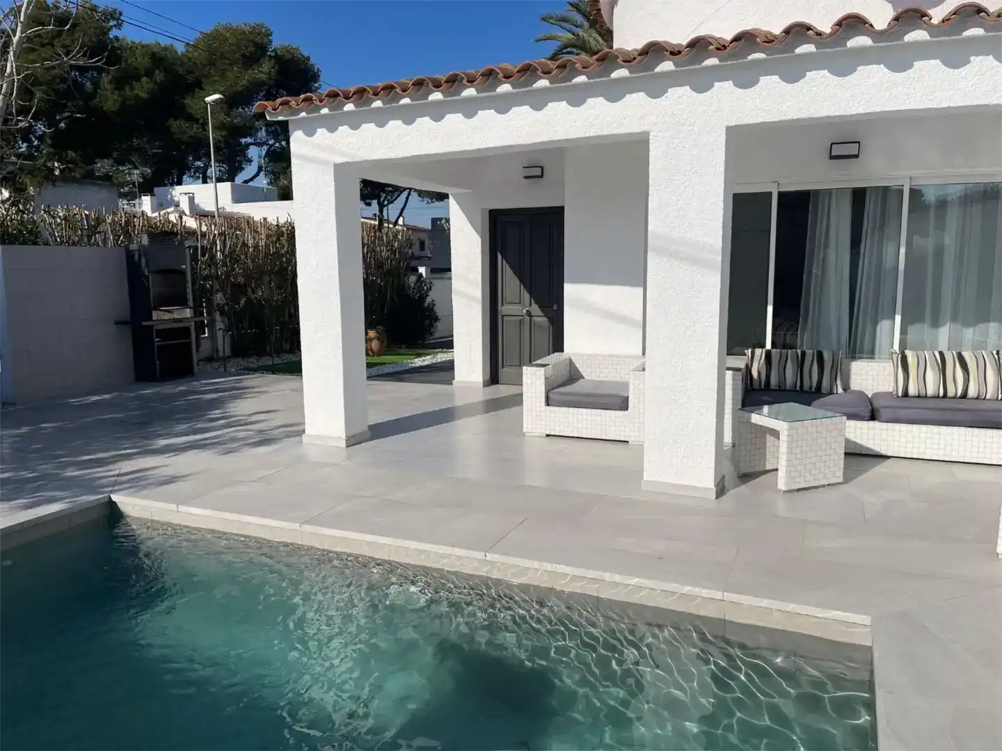 Terraza de Casa o chalet de alquiler en Empuriabrava con Aire acondicionado, Jardín privado y Piscina