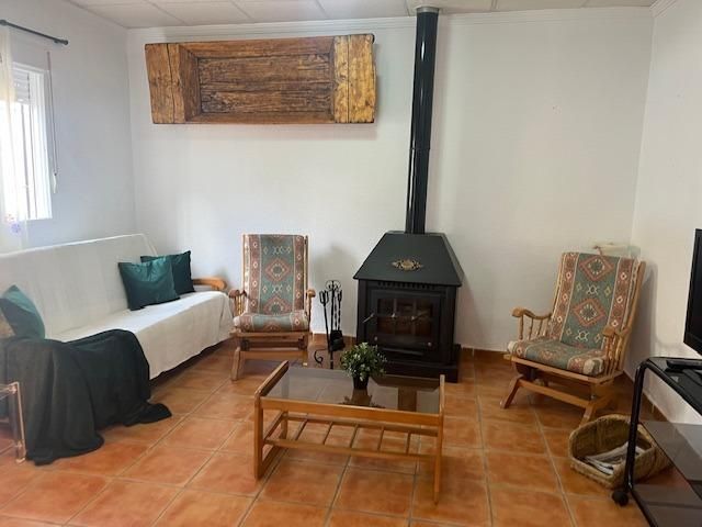 Sala de estar de Finca rústica en venta en Guadix con Jardín privado y Terraza