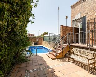 Swimming pool of Single-family semi-detached for sale in  Granada Capital  with Air Conditioner, Heating and Terrace