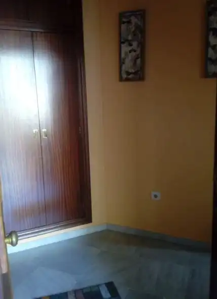 Dormitori de Apartament de lloguer en Alcalá de Guadaira amb Aire condicionat i Moblat
