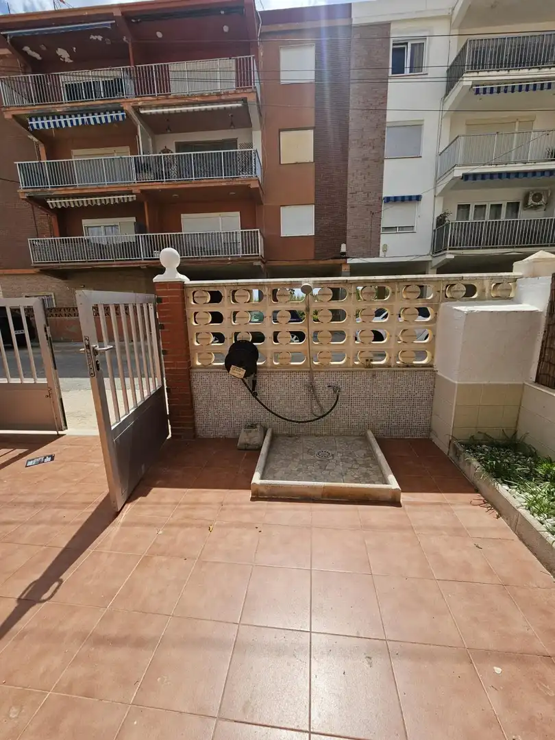 Jardí de Casa adosada en venda en Sueca amb Aire condicionat, Terrassa i Moblat