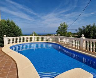 Swimming pool of Single-family semi-detached for sale in Dénia  with Air Conditioner and Terrace