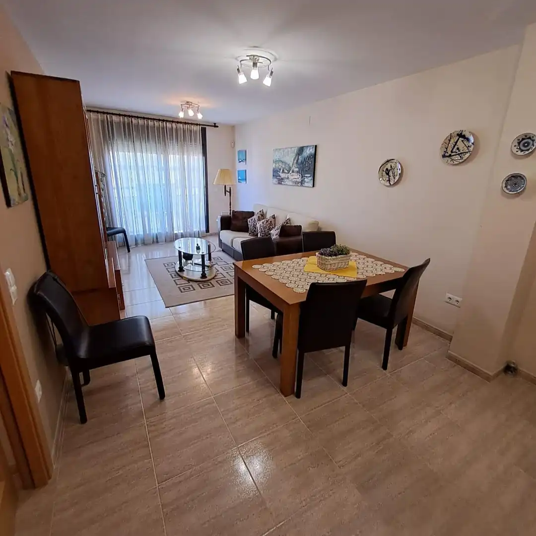 Sala de estar de Piso en venta en L'Ampolla con Aire acondicionado, Terraza y Amueblado