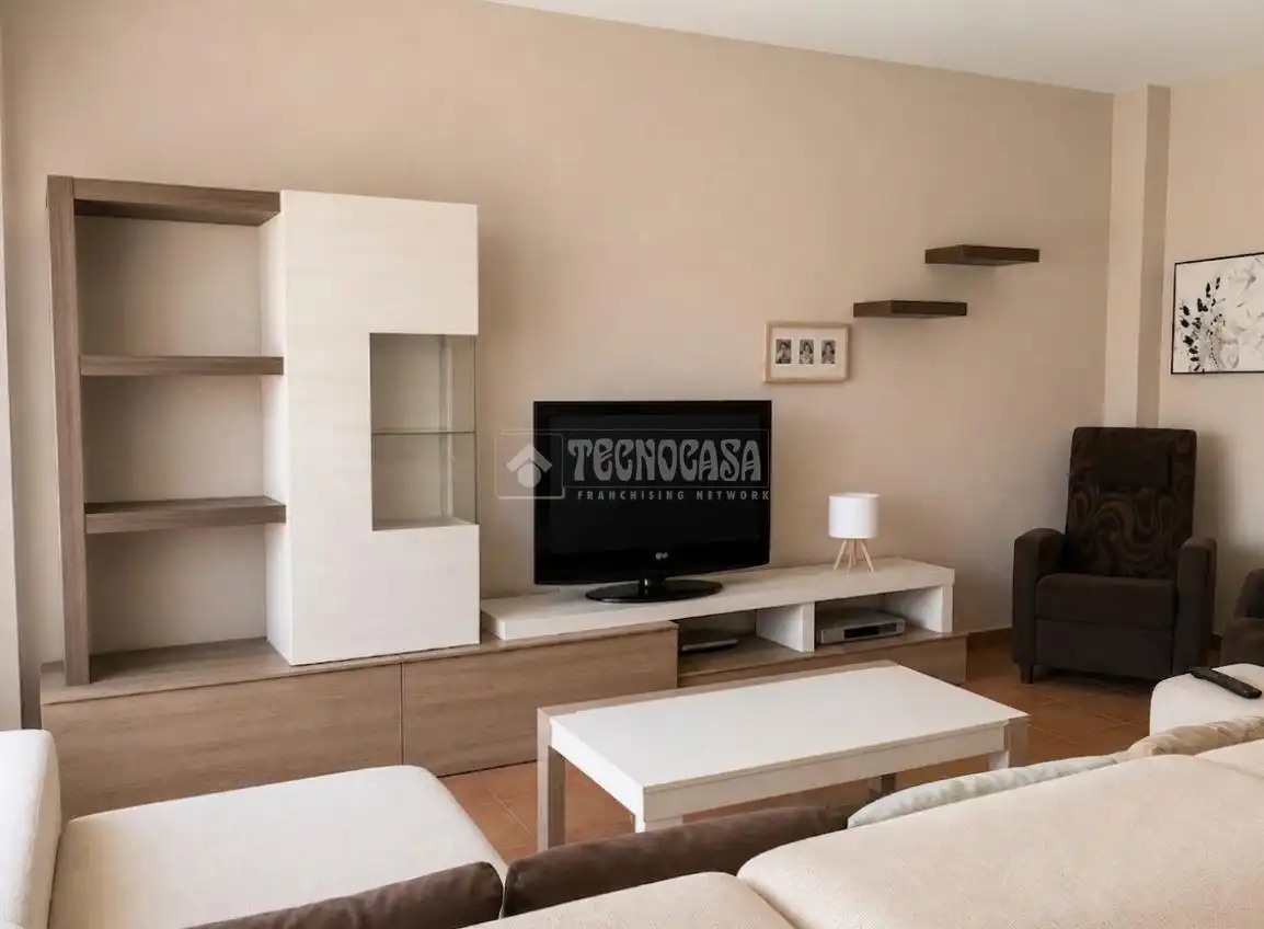 Sala de estar de Casa adosada en venta en Rincón de la Victoria