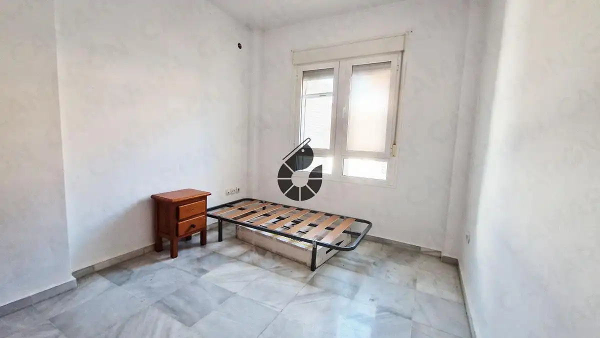 Dormitori de Casa adosada en venda en Coria del Río amb Jardí privat, Terrassa i Alarma