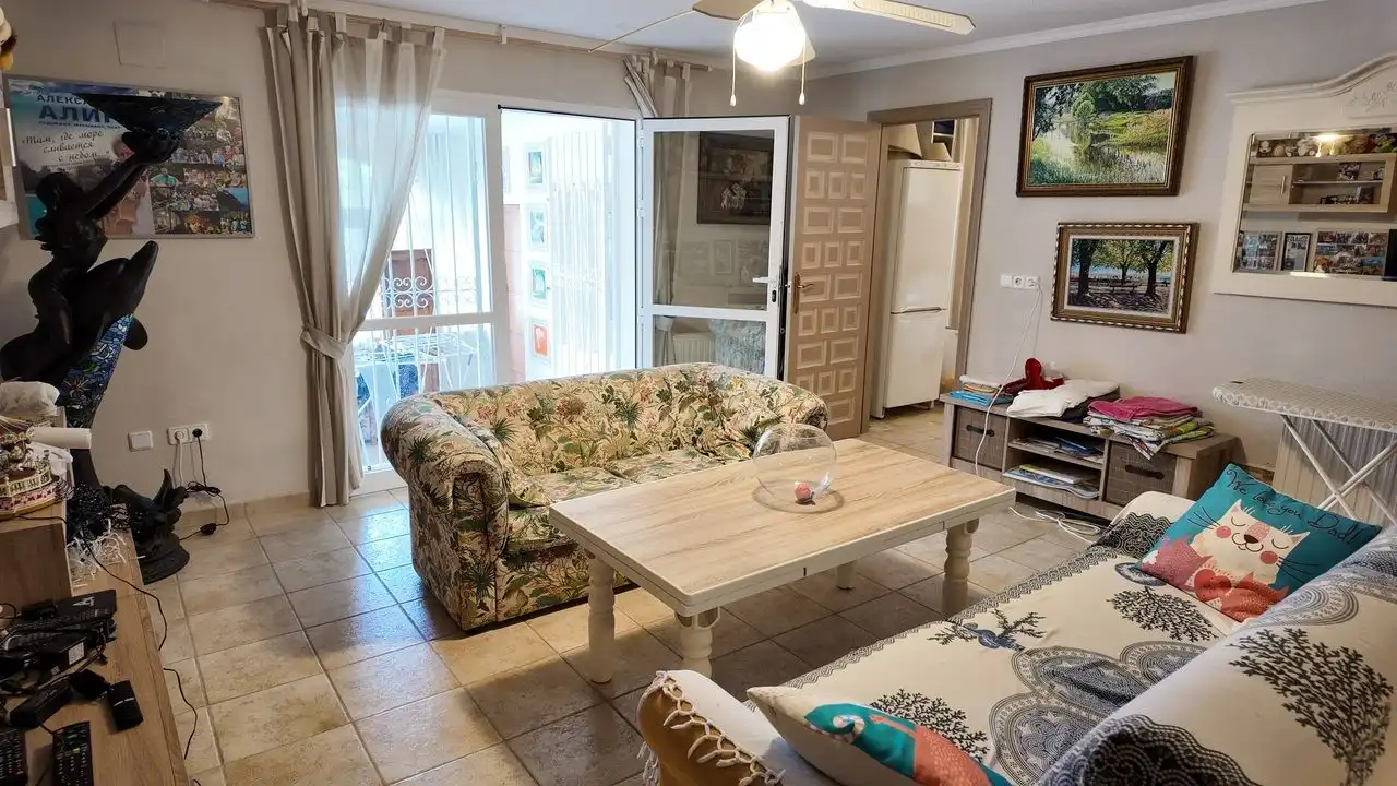 Sala de estar de Casa o chalet en venta en L'Alfàs del Pi con Aire acondicionado, Calefacción y Jardín privado