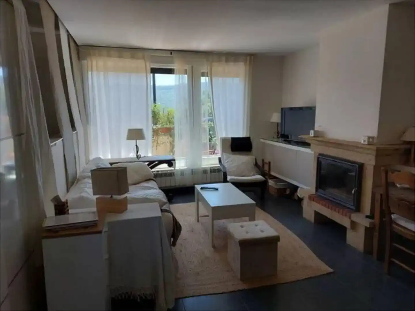 Sala d'estar de Casa adosada en venda en Valdeavellano de Tera amb Jardí privat, Traster i Moblat