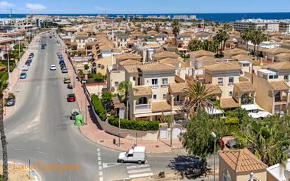 Exterior view of Single-family semi-detached for sale in Orihuela  with Air Conditioner, Heating and Private garden