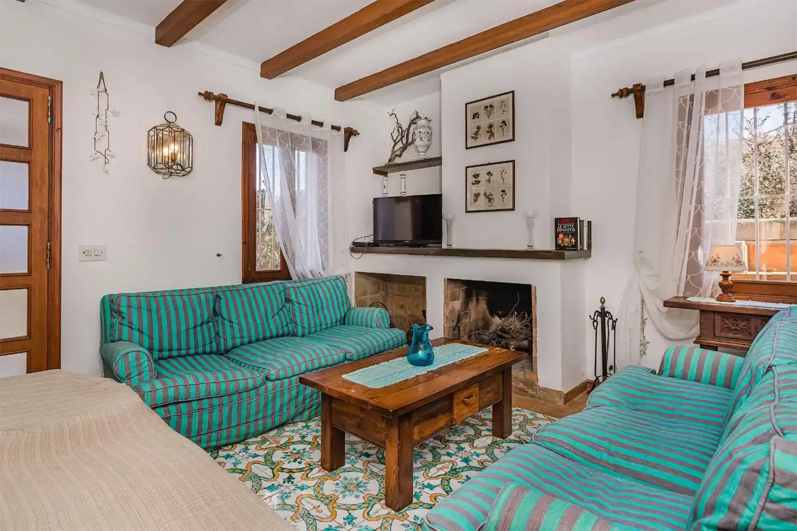 Sala d'estar de Casa o xalet de lloguer en Pollença amb Aire condicionat, Jardí privat i Piscina