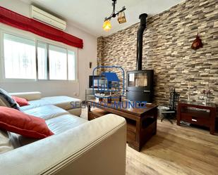 Sala d'estar de Casa adosada en venda en Mazarrón