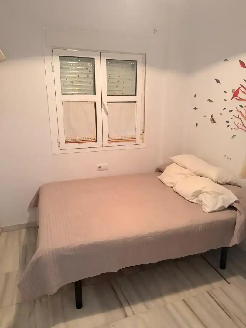 Dormitori de Casa adosada en venda en Chipiona amb Aire condicionat i Balcó