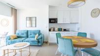 Sala d'estar de Apartament en venda en Benidorm amb Aire condicionat, Jardí privat i Terrassa