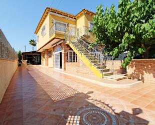 Exterior view of Single-family semi-detached for sale in Elche / Elx  with Air Conditioner, Terrace and Swimming Pool