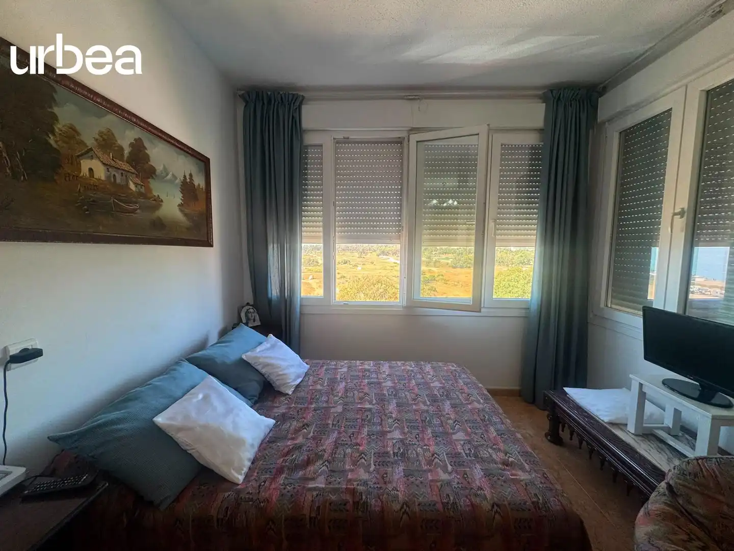 Dormitori de Apartament de lloguer en Málaga amb Piscina comunitària