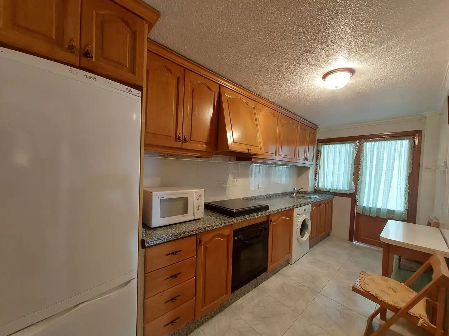 Kitchen of Flat for sale in El Campello  with Terrace, Furnished and Community pool