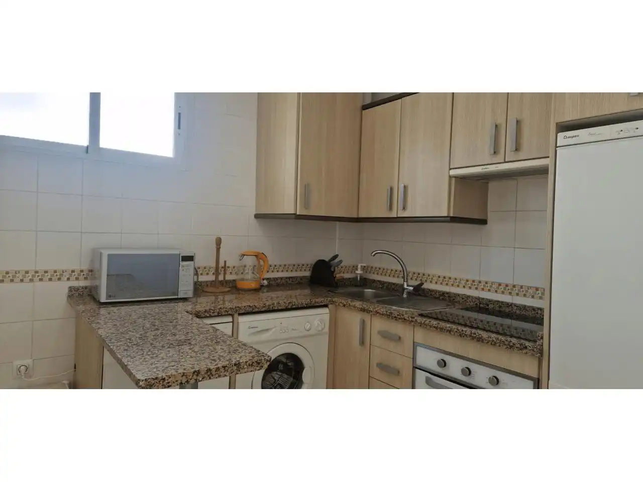 Cuina de Apartament en venda en Benalmádena amb Aire condicionat, Jardí privat i Terrassa