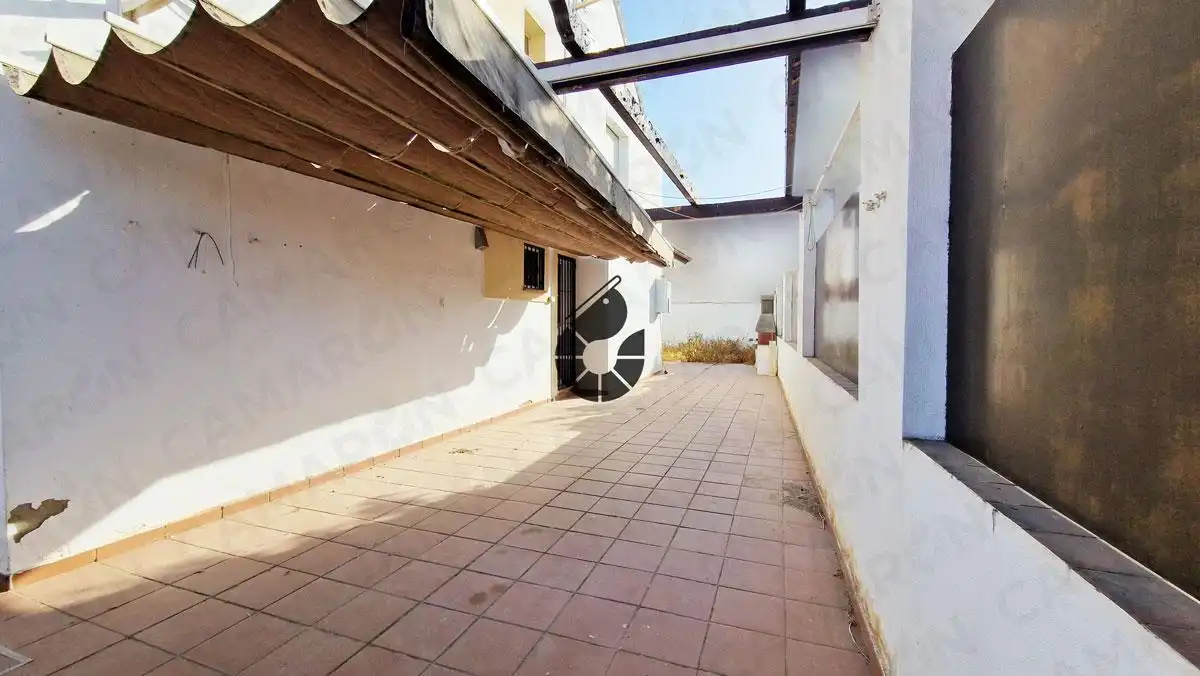 Terrassa de Casa adosada en venda en Coria del Río amb Jardí privat, Terrassa i Alarma