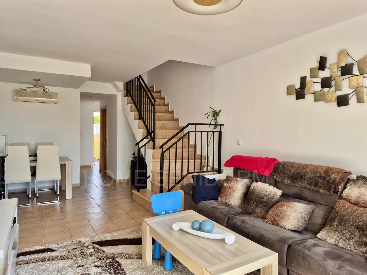 Sala de estar de Casa adosada en venta en Finestrat con Jardín privado y Piscina comunitaria