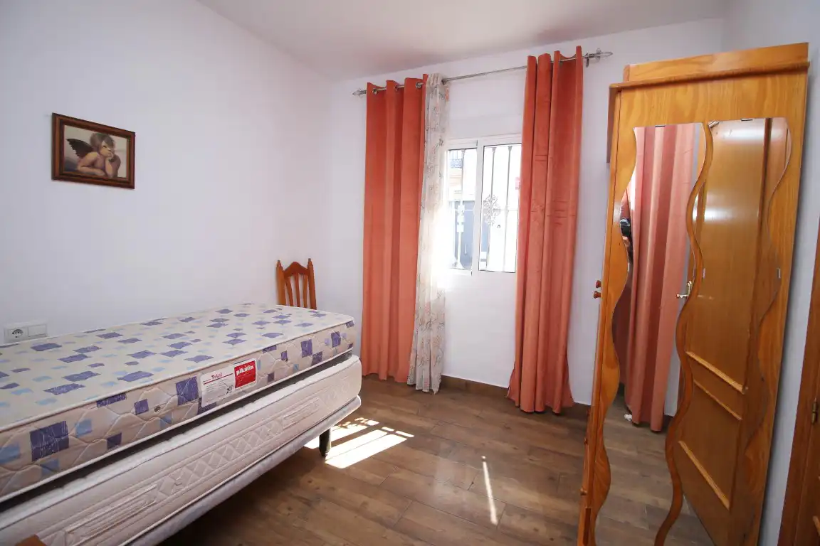 Dormitori de Casa adosada en venda en Vélez-Málaga amb Aire condicionat, Calefacció i Terrassa