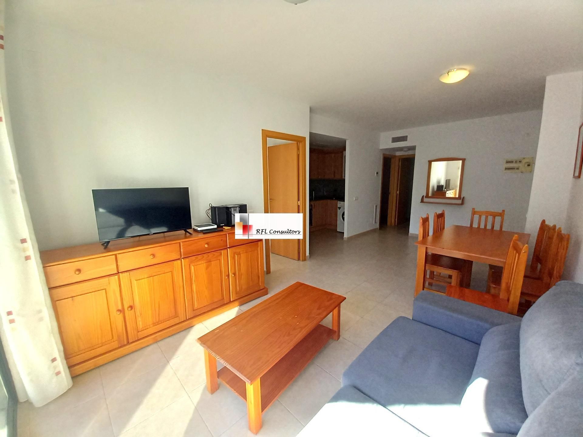 Sala d'estar de Apartament en venda en L'Ampolla amb Moblat, Balcó i Piscina comunitària