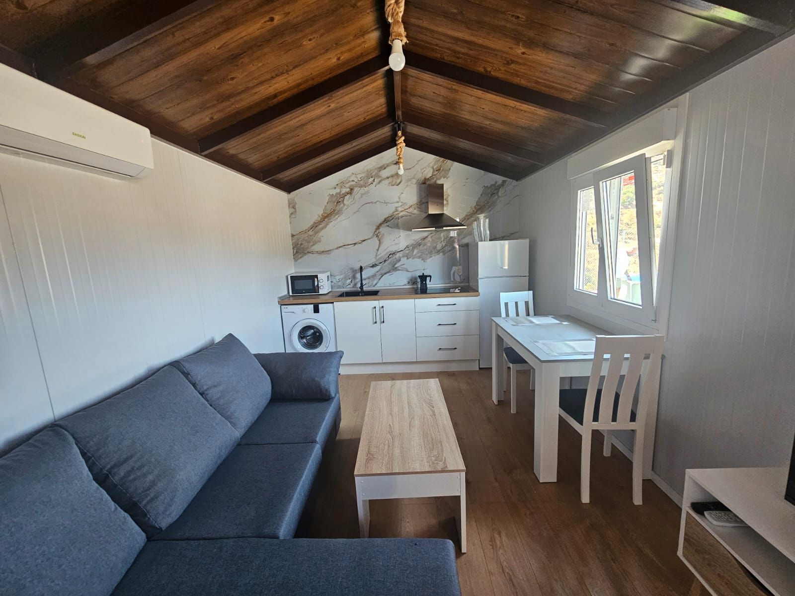 Sala d'estar de Finca rústica de lloguer en Guaro amb Aire condicionat, Calefacció i Jardí privat