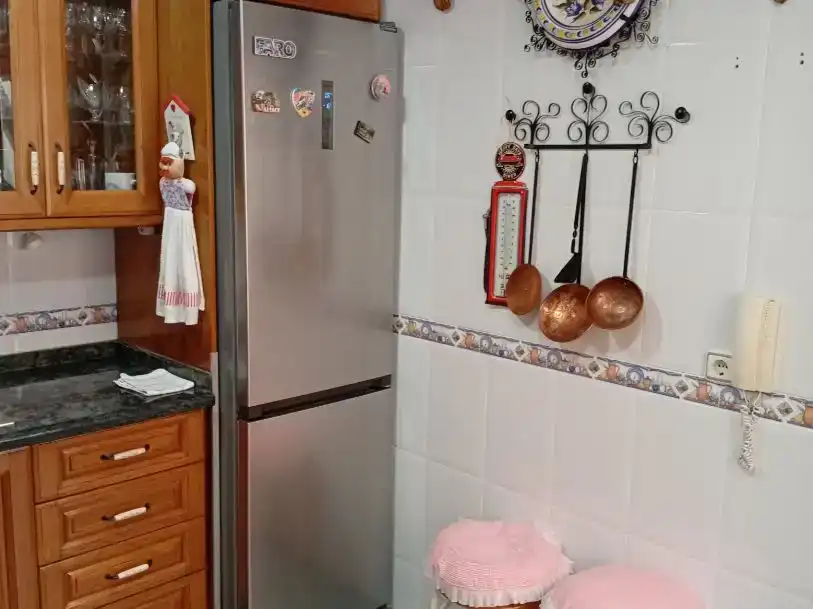 Cuina de Casa adosada en venda en Motril amb Aire condicionat, Jardí privat i Moblat