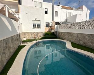 Swimming pool of Single-family semi-detached for sale in Roquetas de Mar  with Private garden and Swimming Pool