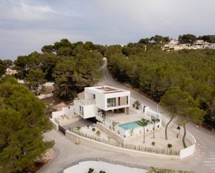 Vista exterior de Casa o xalet en venda en Moraira amb Aire condicionat, Terrassa i Piscina