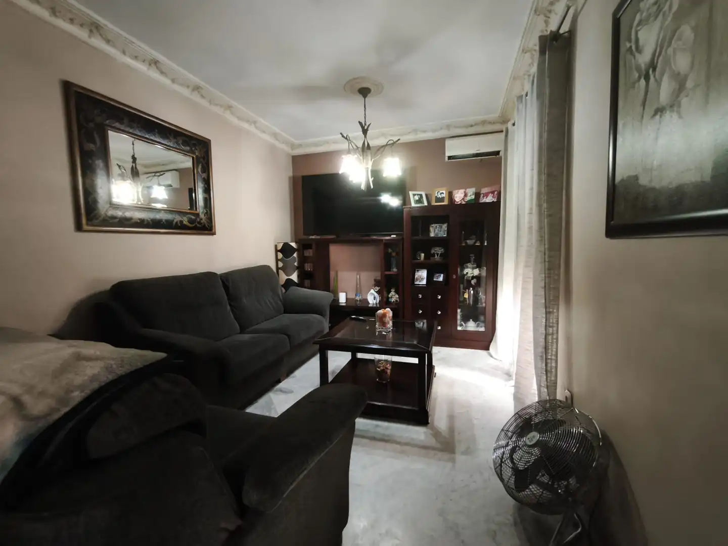 Sala d'estar de Casa adosada en venda en Mairena del Alcor amb Aire condicionat i Moblat