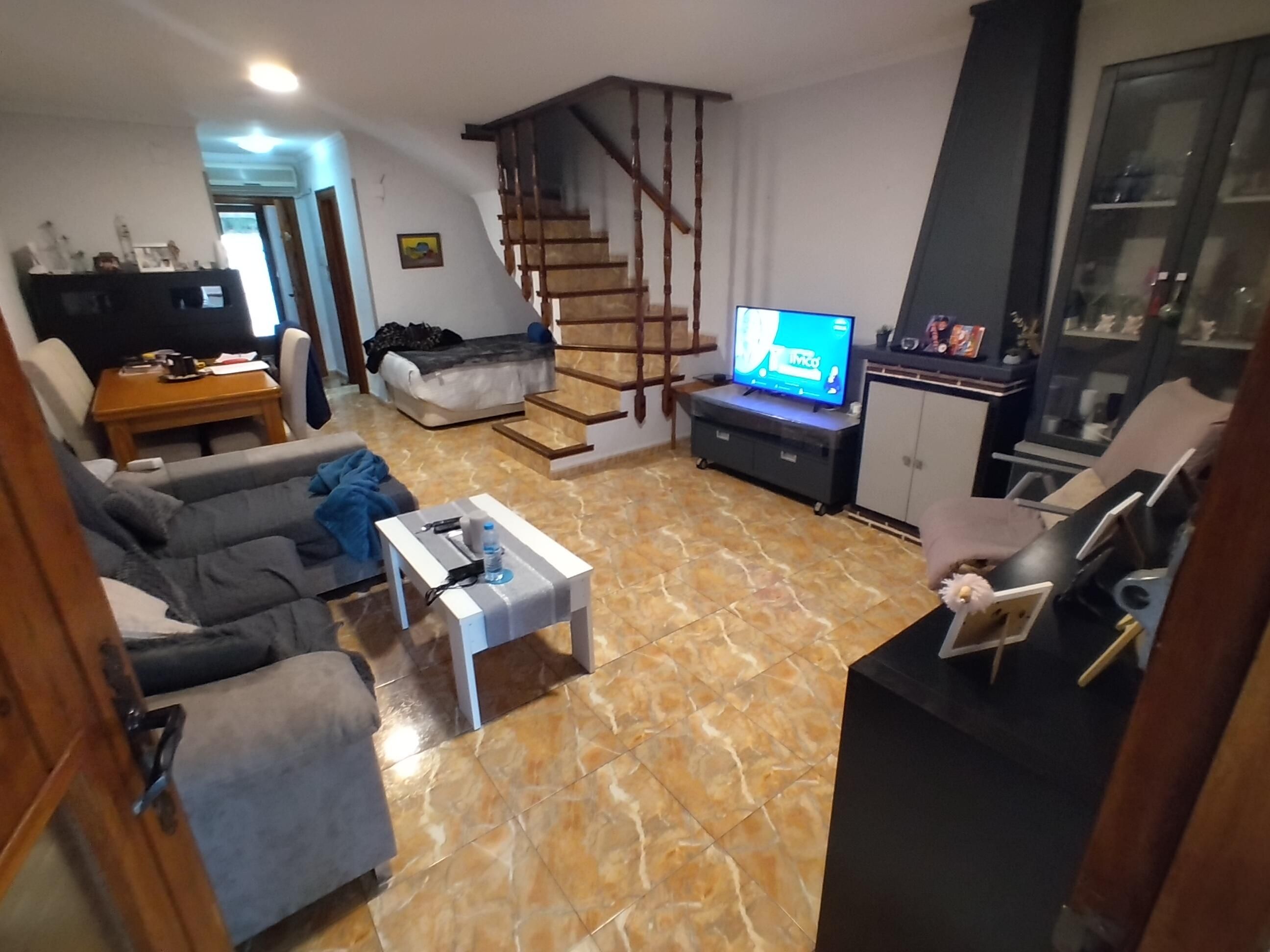 Sala d'estar de Casa adosada en venda en Dénia amb Aire condicionat, Calefacció i Jardí privat