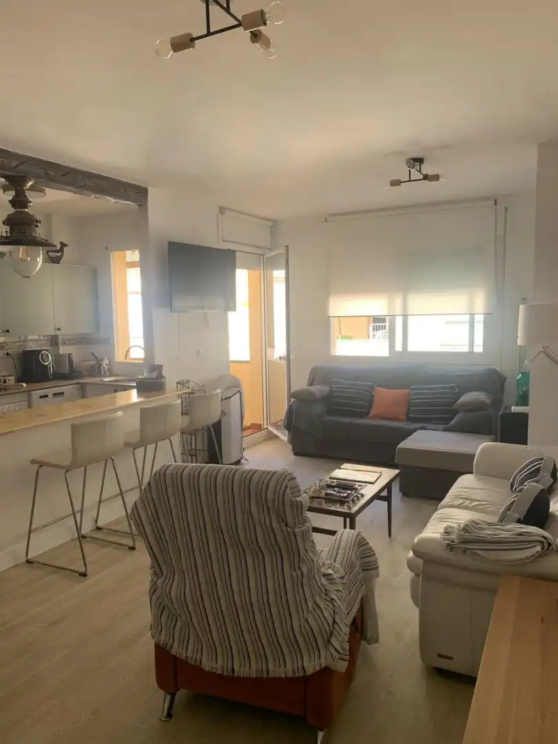 Sala d'estar de Àtic de lloguer en Torrox amb Piscina comunitària