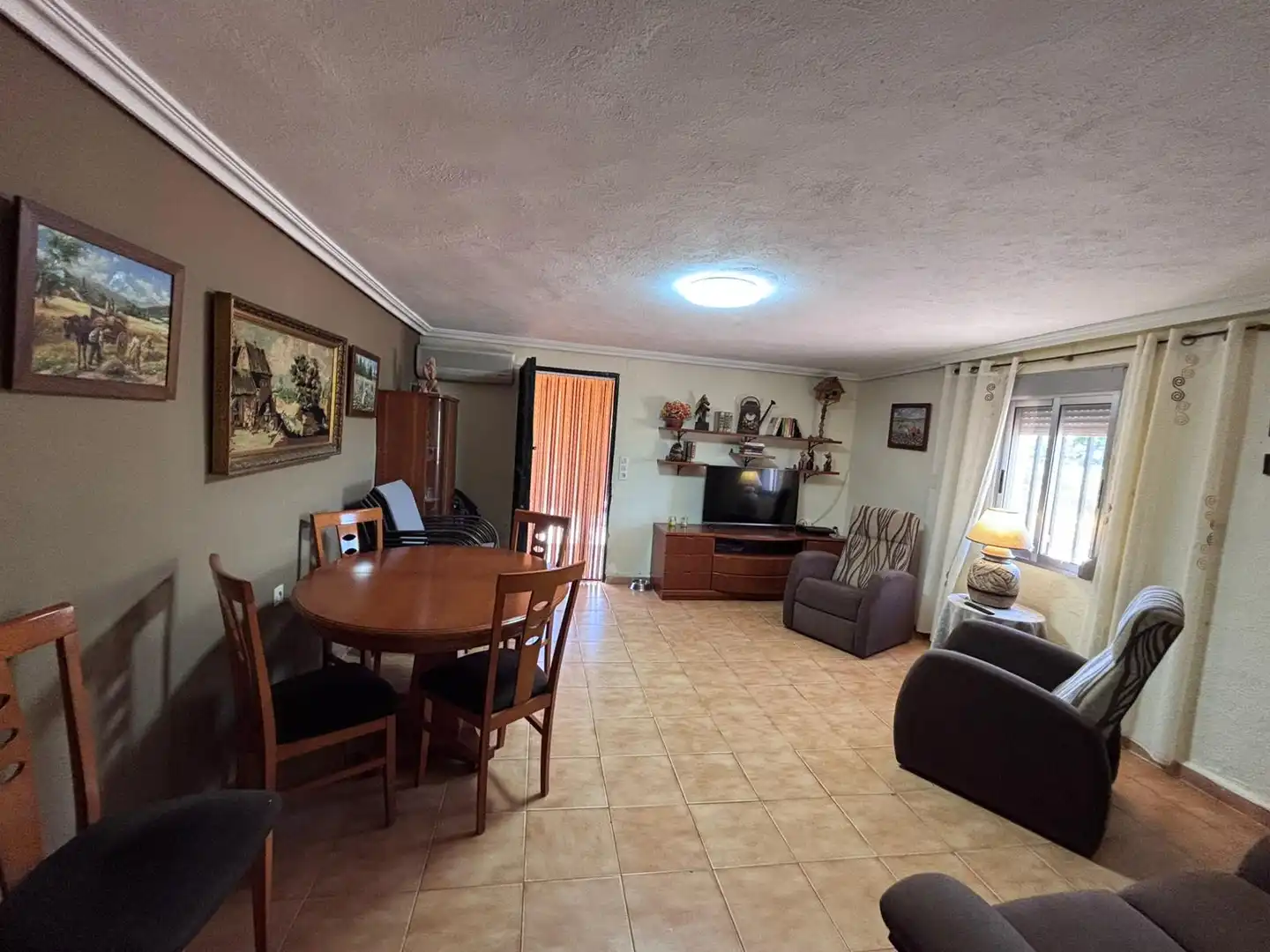 Sala de estar de Casa o chalet en venta en Torrent con Jardín privado, Piscina y Amueblado