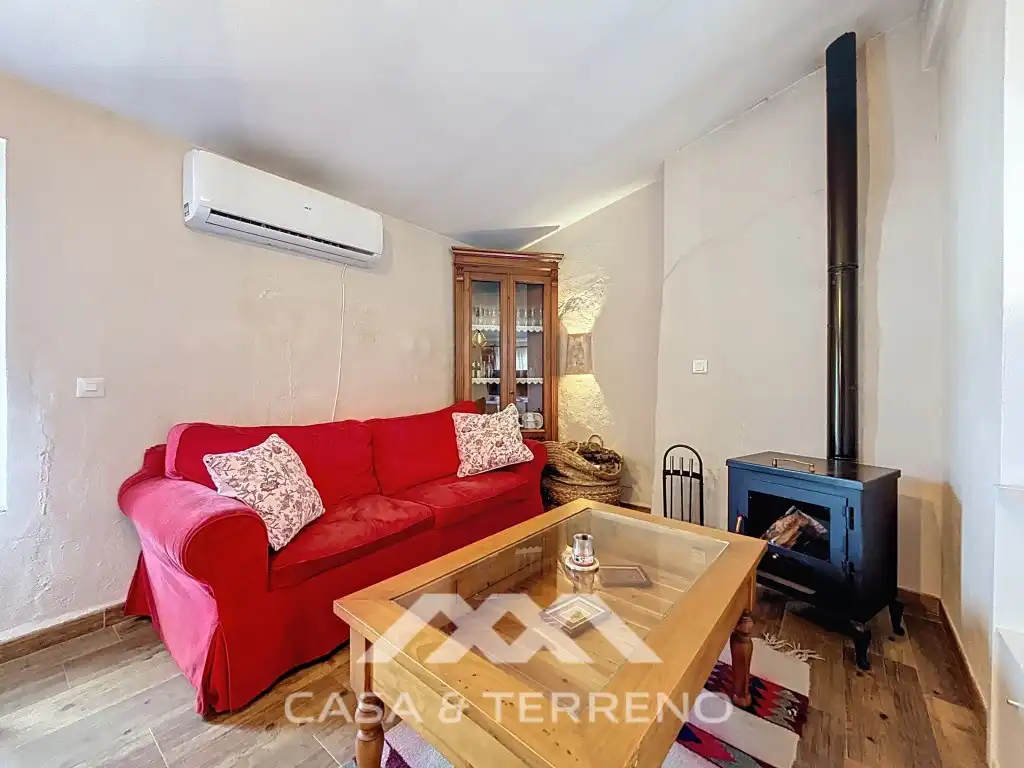 Sala d'estar de Casa o xalet en venda en Comares amb Aire condicionat, Jardí privat i Terrassa