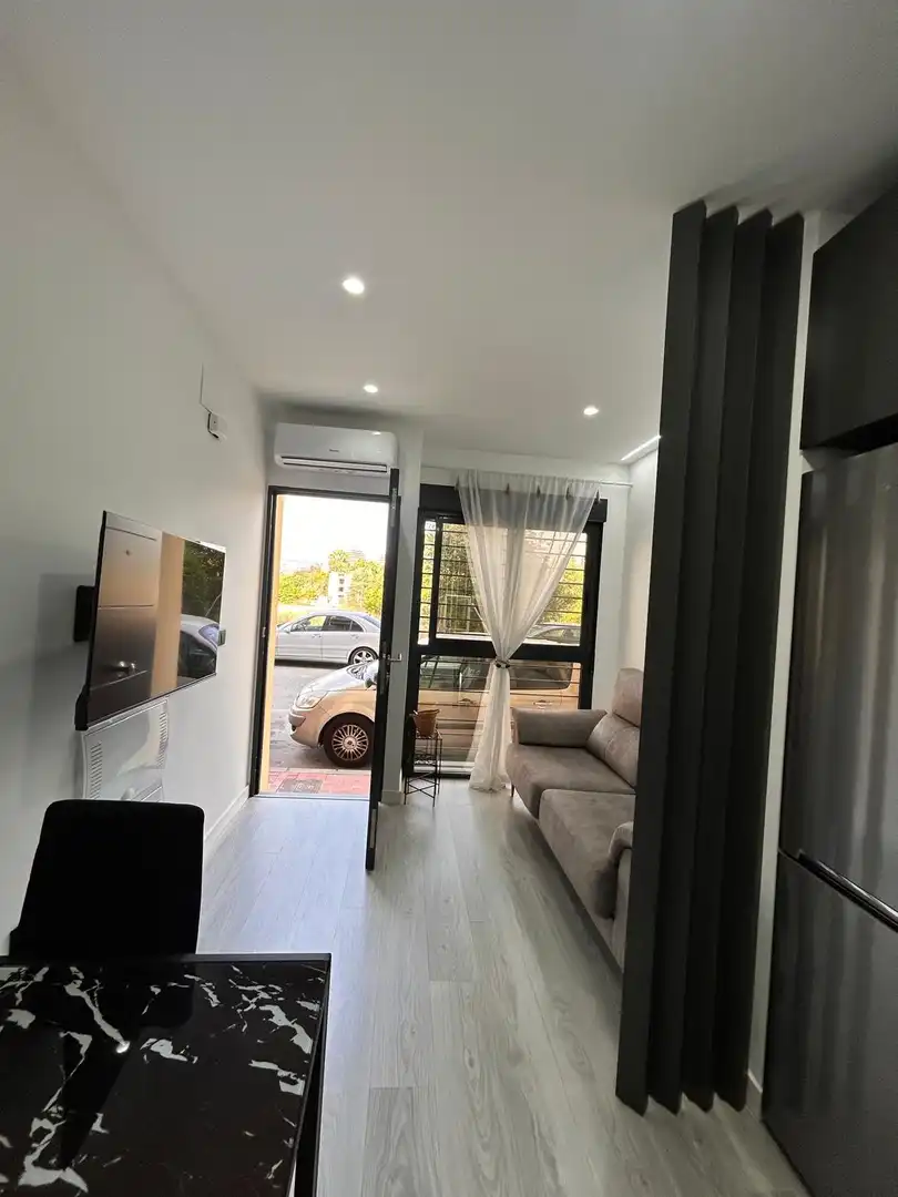 Sala d'estar de Loft de lloguer en Murcia amb Aire condicionat i Moblat