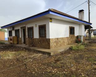 Exterior view of House or chalet for sale in El Robledo    with Air Conditioner and Terrace