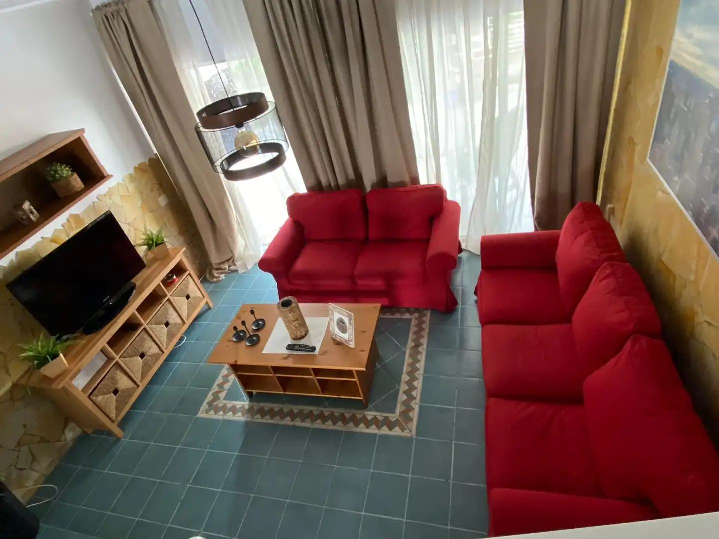 Sala d'estar de Casa adosada en venda en Mogán amb Aire condicionat, Terrassa i Traster