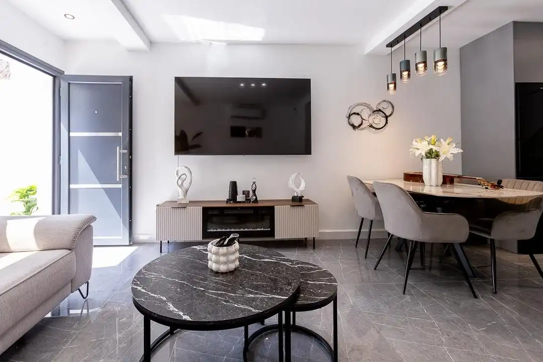 Sala de estar de Casa adosada en venta en Málaga con Aire acondicionado, Terraza y Amueblado