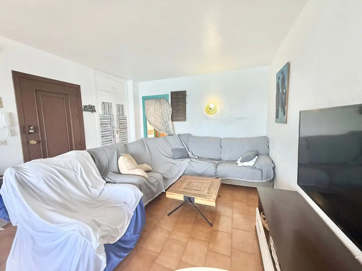 Sala d'estar de Apartament de lloguer en La Manga del Mar Menor amb Calefacció, Terrassa i Piscina