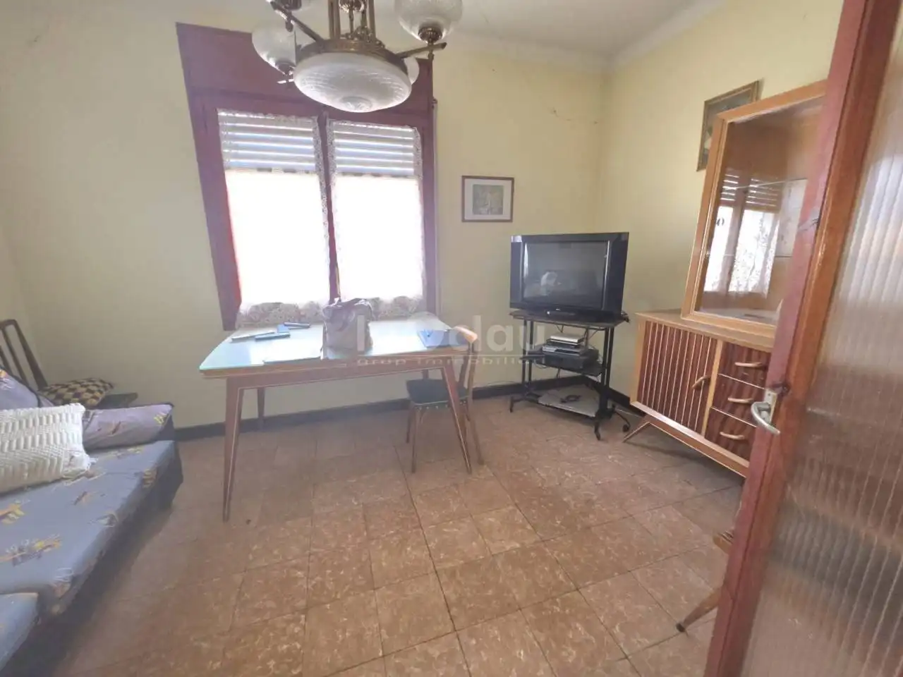 Sala d'estar de Casa adosada en venda en Tona amb Jardí privat, Terrassa i Moblat