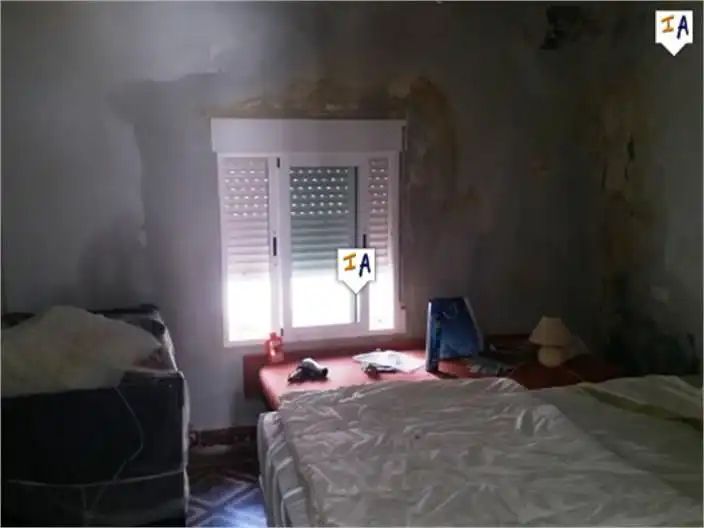 Dormitori de Casa adosada en venda en Agrón amb Terrassa