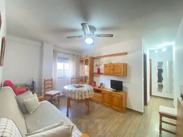 Sala d'estar de Apartament en venda en La Antilla amb Aire condicionat i Moblat