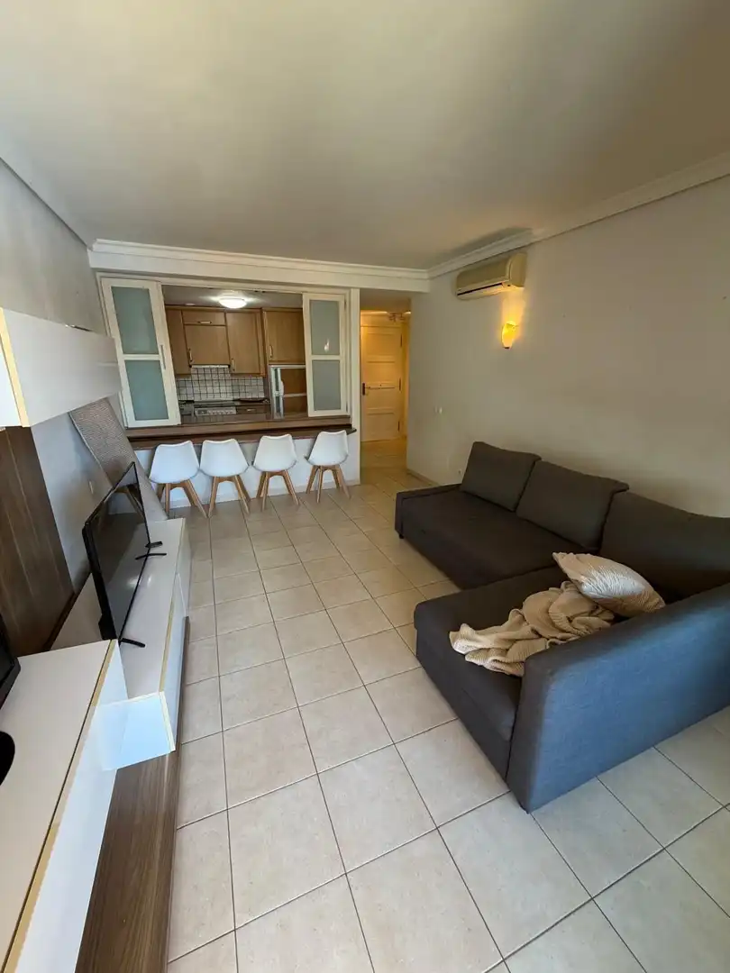Sala d'estar de Pis de lloguer en Santiago del Teide amb Terrassa i Piscina comunitària