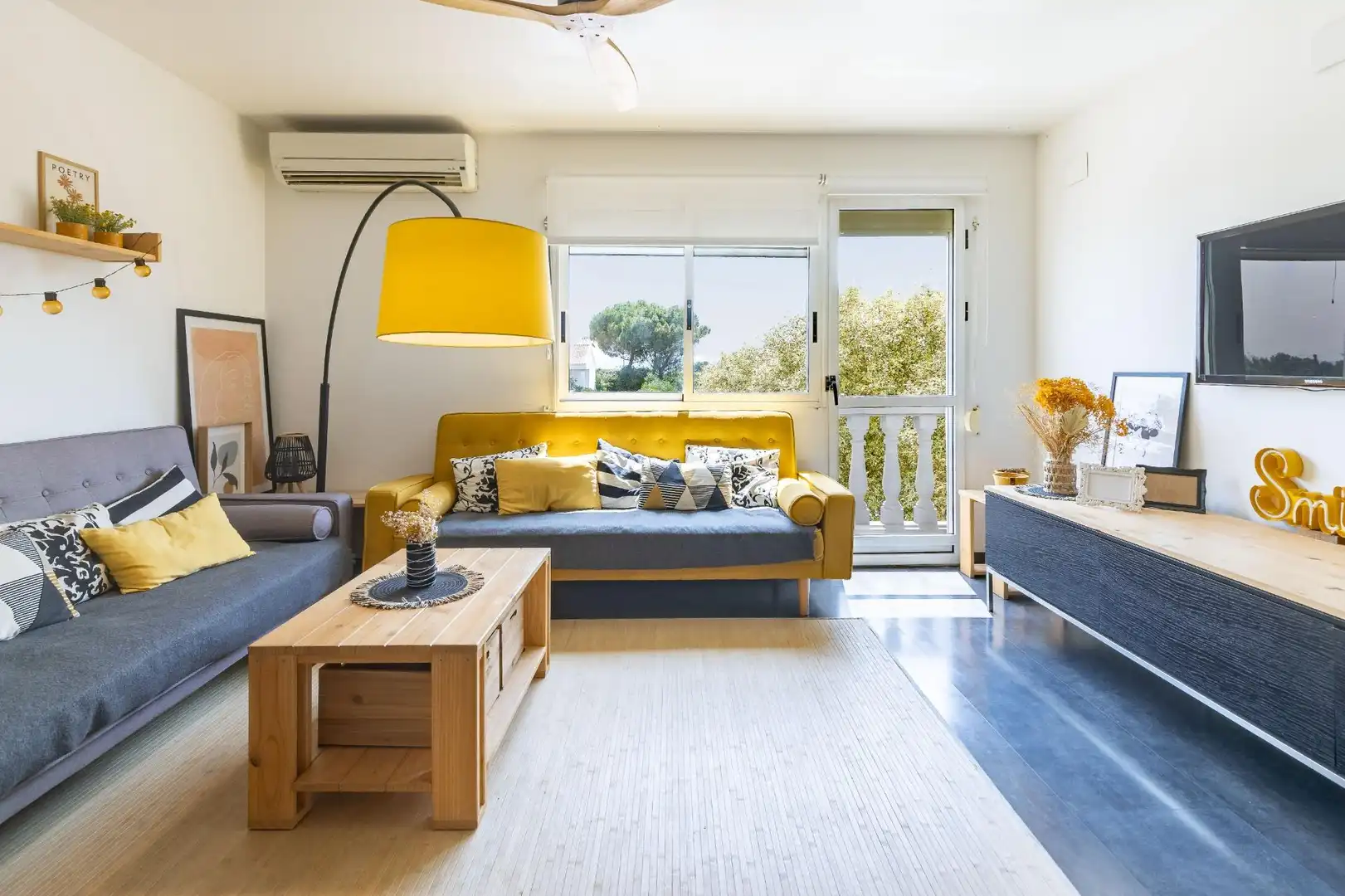 Sala de estar de Casa adosada en venta en Benimuslem con Aire acondicionado, Calefacción y Parquet
