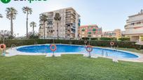 Piscina de Casa adosada en venda en Salobreña amb Jardí privat, Parquet i Terrassa